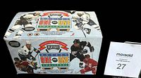 Original retail box with colorful hockey player images and game branding for Playoff Hockey One on One Challenge card game.
