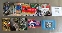 Wide top view of multiple Tim Hortons hockey cards laid out, showing a mix of players and inserts including Carey Price and others.