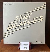 Front cover of the Silver Beatles Volume 1 album showing the silver and black stylized text.