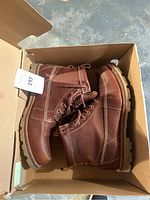 Pair of L.L.Bean boots in box showing overall boots