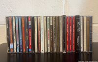 Front view of all 20 CD spines showing titles and artists to illustrate lot contents and condition.