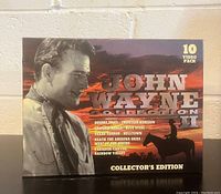 Front of the boxed John Wayne Collection II VHS set showing John Wayne photo and titles included.
