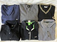 Lot of six mens designer sweaters and golf shirts in size medium arranged for overview