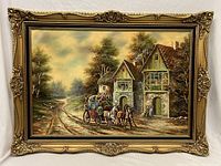 Full view of vintage oil painting depicting horse carriage with four riders and a man walking, in front of old houses framed in elaborate gold carved wood frame.