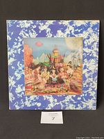 Front side of the vinyl album cover showing colorful, psychedelic 3D gatefold artwork.
