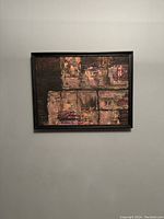 Full view of the framed abstract oil painting on canvas showing textured squares and rectangles in mixed dark and earthy tones.