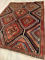 Full view of the Persian Hamadan rug showing the geometric design and color scheme.