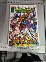 Front cover of Wildcats: Sport of Gods #9 comic book in a protective sleeve.