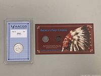 Lot contents showing the 1963 D Franklin Half Dollar graded coin on the left and the Americas First Citizens card with 1907 penny and 1936 nickel on the right.