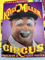 Close-up photo of Kelly Miller Circus program cover featuring clown portrait and title