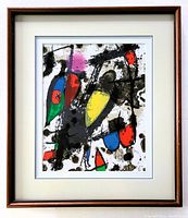 Framed Joan Miró lithograph, showing full frame, artwork, and triple mat under glass.
