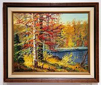 Frontal image of oil painting depicting autumn trees in a wooden and cream vintage frame