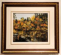 Front view of oil painting in vintage wood frame showing autumn landscape scene and frame condition.