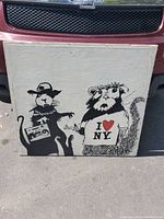 Front side image displaying Banksy-inspired rats artwork on wooden board