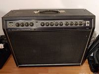 Front view of amp showing overall condition, tolex, handle and grille