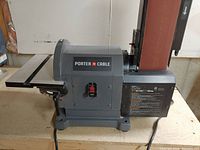 Side view showing Porter-Cable logo, power switch and overall bench sander structure