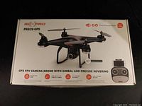 Closed retail box showing drone image, branding and feature callouts