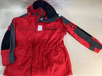 Front view of waterproof red Jeantex T3000 jacket showing hood and front pockets