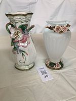Both vases displayed together, showing overall size and decoration.