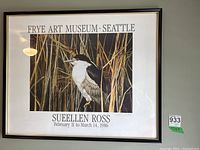 Framed poster of a bird in reeds with 'FRYE ART MUSEUM • SEATTLE' above and artist and exhibit info below, signed by Sueellen Ross 1986.
