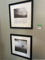 Pair of framed landscape photo prints hung on a wall, showcasing overall presentation and condition.
