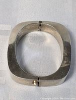 Top-down view showing square shape and polished finish