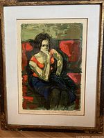 Photograph of framed lithograph showing entire artwork and frame, highlighting vintage condition and frame wear.