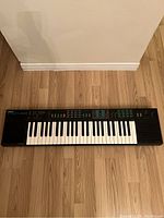 Yamaha PSR-22 keyboard front view showing full 49 keys and overall layout.