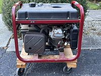 Left side view showing engine, frame and fuel tank