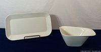 Image showing both the rectangular platter and irregular-shaped bowl side by side against a neutral background.