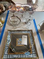 Overview of the crystal stemware, clear glassware and decorative plates
