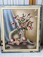 Full image of the framed artwork showing the flowers, vase, fruit, and part of the frame.