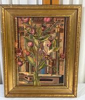 Full view of the original framed painting showing floral and architectural elements in a gold decorative frame.