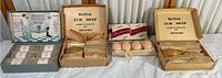 Top view of multiple boxed vintage British Tub Soap collections showing paper wrapped and boxed soap bars.