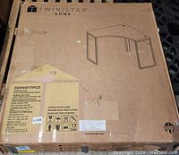 Box showing Twinstar Home logo and desk illustration