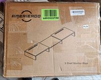 Box packaging of AMERHERO 3 Shelf Monitor Riser showing brand and product illustration.