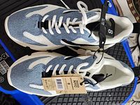 Top view of the new Madden NYC women sneakers size 8 showing denim and white mesh materials, white laces, and size tag.