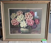 Large framed floral still life art piece showing multi-colored flowers in a green vase with ornate gold frame