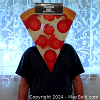 Person wearing the foam pizza slice face mask showing size and fit.