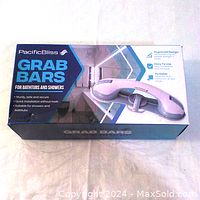 Box of PacificBliss Grab Bars for Bathtubs and Showers, showing product image and features printed on box.