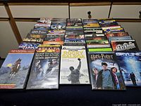 All 59 DVD cases laid out in rows