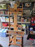 Front view of full H-frame easel showing height, width, paint shelf, star knobs