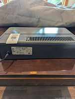 Side view of the Kenmore Electronic Air Cleaner showing the model number label and power cord.