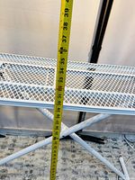 Photo showing the length of the ironing board surface is approximately 32.5 inches