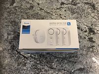 Box front showing Govee Wi-Fi gateway and three water detector sensors.