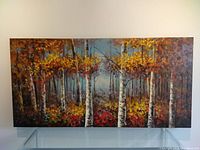 Front-on view of full canvas painting showing birch trees in fall