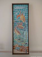 Full vertical view of framed mosaic tile wall art showing a tropical fish scene with blue and turquoise tile background.