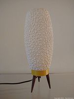 Full view of lamp powered off showing overall appearance and form