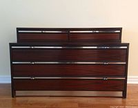 Front view showing full dresser with five drawers and chrome accents