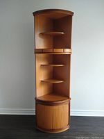 Full front view of the entire corner shelf unit